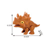 An orange plastic interactive finger biting dinosaur toy, resembling a Triceratops or Tyrannosaurus, shown with dimensions.