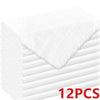A stack of white raw-edge polyester cloth napkins is shown, with one napkin unfolded and visible.