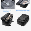 A black expandable travel laptop backpack demonstrating a one-way exhaust valve and vacuum compression features.