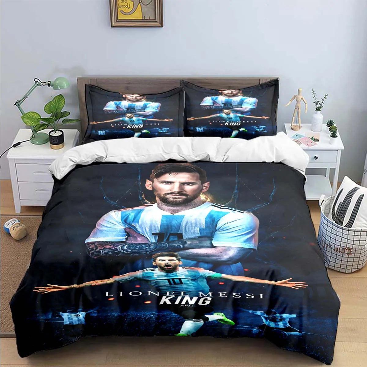 A dark blue and black duvet cover featuring a large graphic of Lionel Messi as a king.