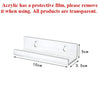 A clear acrylic floating wall display rack with a protective film, measuring 10cm long and 3.5cm deep.