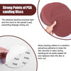 Close-up view of pink sanding discs and a white disc showing various grit numbers like P40, P400, and P4000.
