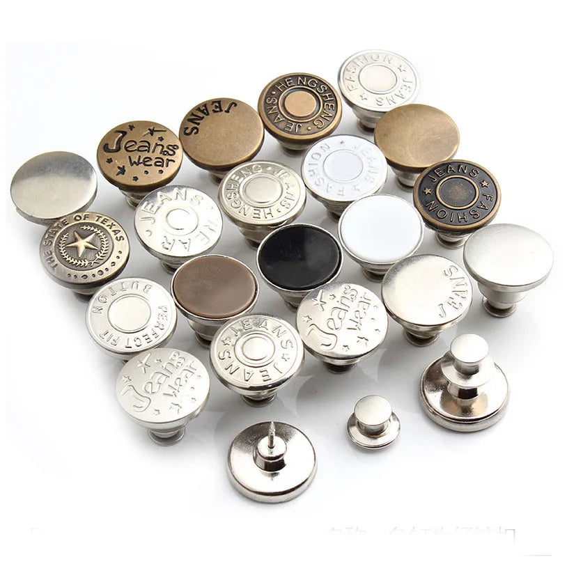 A collection of various metal snap buttons and hardware components for instant no-sew jean repairs.