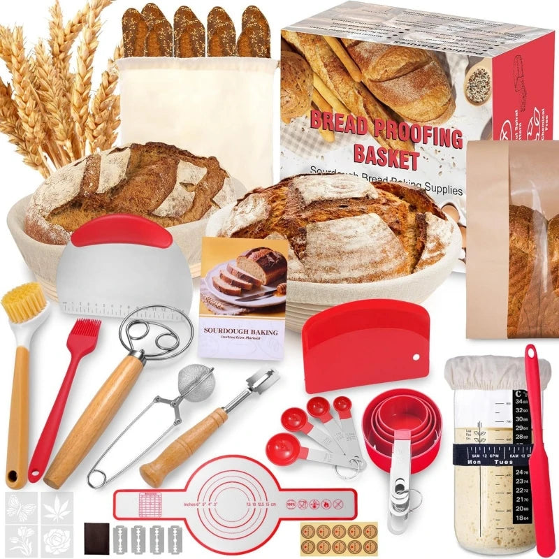 A kit of sourdough bread baking essentials including tools like spatulas, measuring tools, and a loaf of bread.