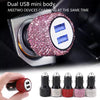A close-up view of a dual USB mini body charger with pink and silver rhinestones, showing the charging ports.
