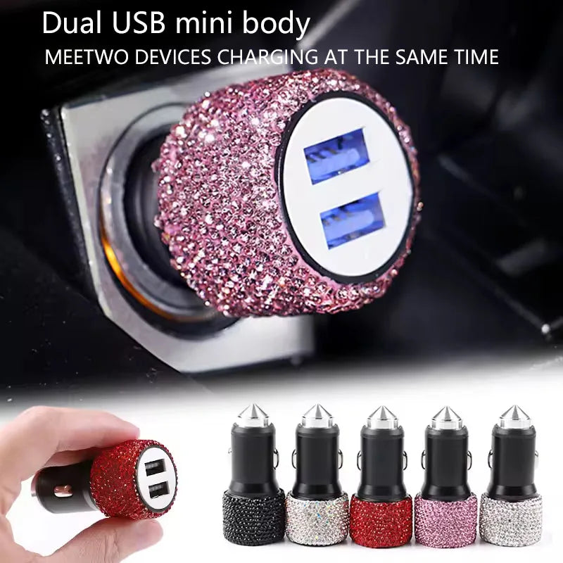 A close-up view of a dual USB mini body charger with pink and silver rhinestones, showing the charging ports.