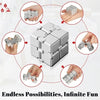 A silver metal infinity fidget cube shown from multiple angles being held by hands.