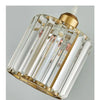 A diamond-shaped crystal glass pendant light with a gold iron frame.