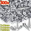 A pile of silver metal spike studs and pins in various sizes, including 7x10mm, 7x14mm, and 7x20mm.