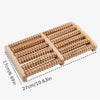 Wooden foot massage roller with parallel ridges for reflexology and tension relief