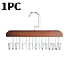 A wooden hanging clothes rack with multiple metal hooks for hanging clothes.