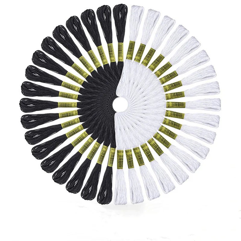 A 24-piece embroidery floss set featuring a fan pattern of white and black threads.