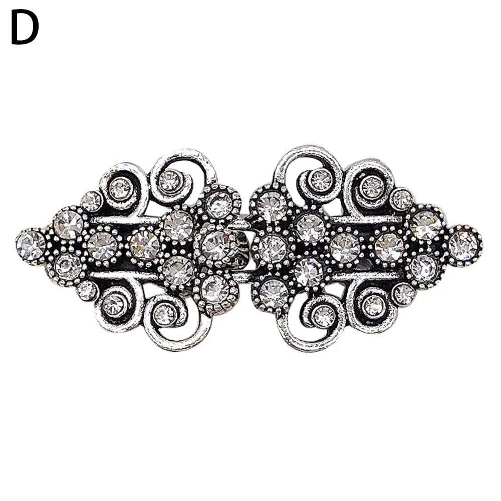 Vintage silver swirl clip for holding cardigans and shawls