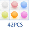 A collection of 42 reusable splash water balloons in various colors including white, pink, blue, yellow, and orange.