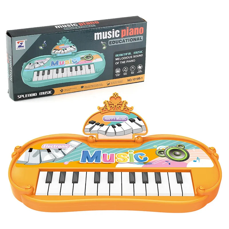 An orange electronic piano toy with a microphone and a piano educational box.