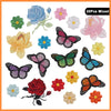 A collection of mixed embroidered iron-on patches featuring various flowers and butterflies in shades of pink, blue, yellow, 