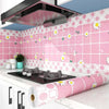 Pink floral self-adhesive kitchen splashback sticker wallpaper applied to a tiled wall.
