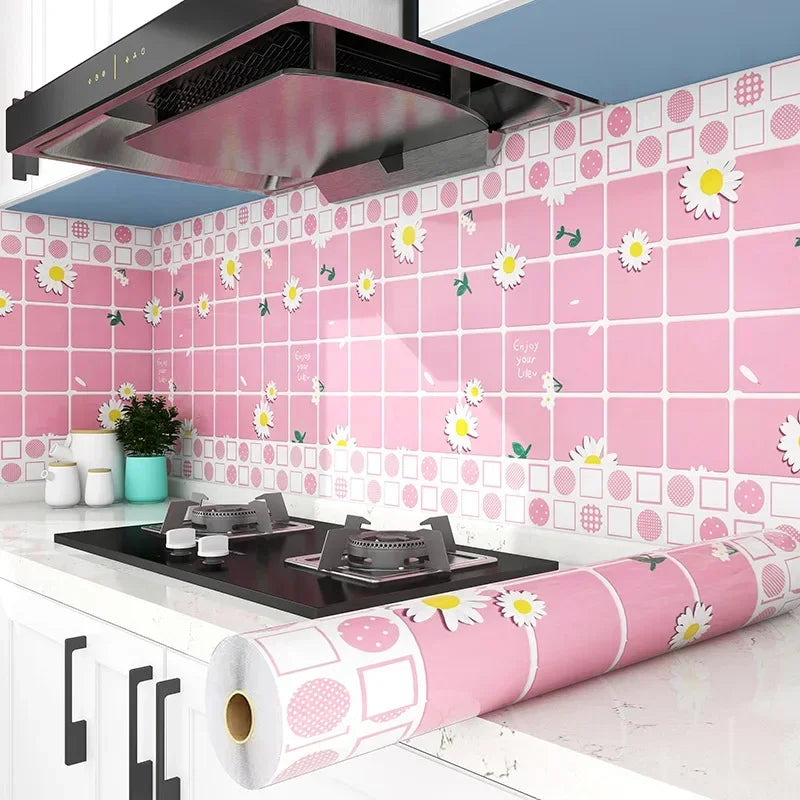 Pink floral self-adhesive kitchen splashback sticker wallpaper applied to a tiled wall.