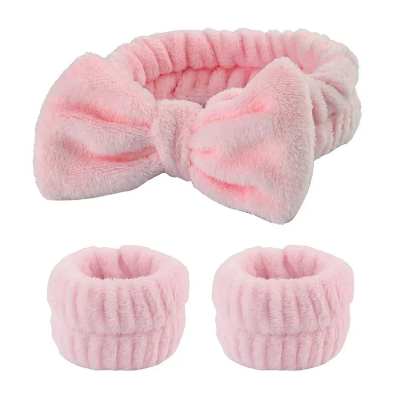 Pink microfiber wrist washing bands or face-saving cuffs with a fluffy texture