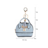 Light blue compact PU leather earbud case with a gold-tone keychain attached.