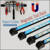 A set of magnetic tool rack strips and tools including pliers, hammers, and wrenches.