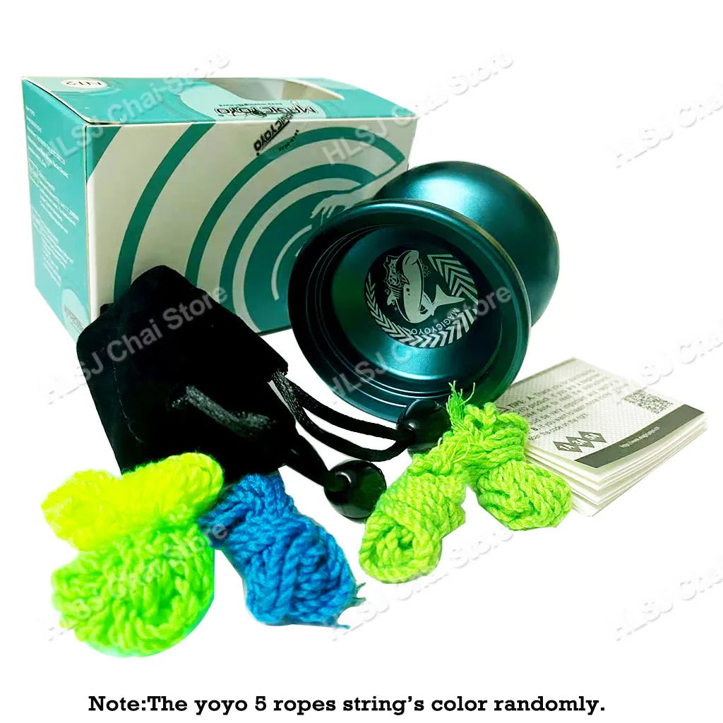 A green box and several yellow, blue, and lime green yarn ropes are displayed next to a dark metal yoyo.