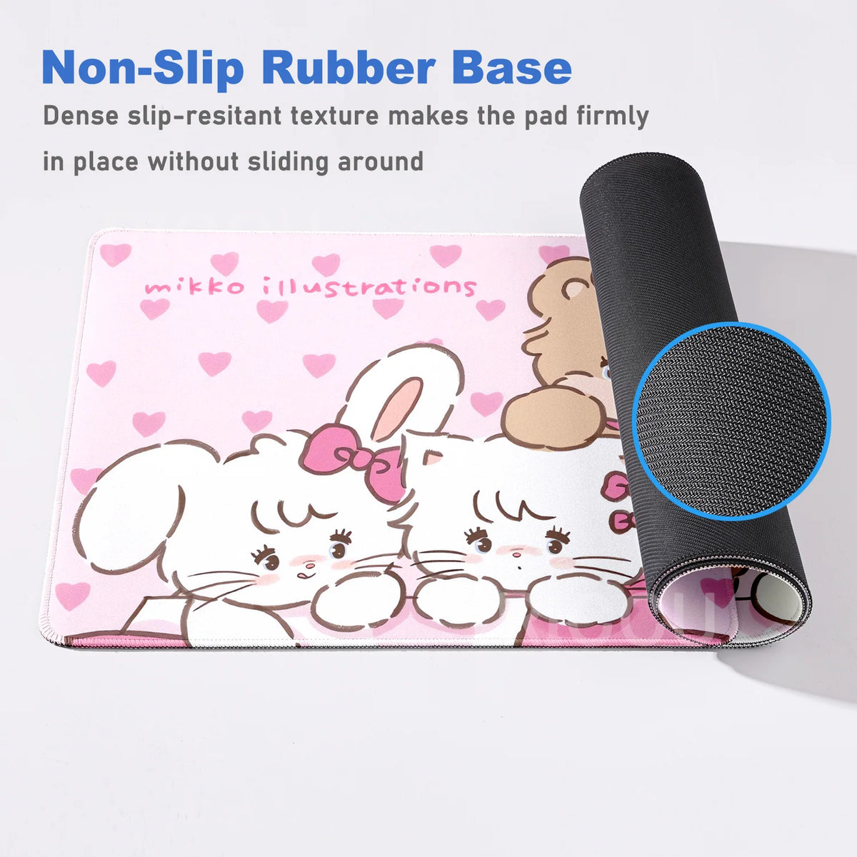 Pink illustration desk mat featuring two cute white cartoon cats with a non-slip rubber base.
