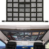 A black ceiling cargo net organizer installed in the interior of a vehicle, visible through the sunroof.