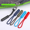 A set of replacement zipper pulls with nylon cords in various colors including black, blue, olive green, cyan, and red.