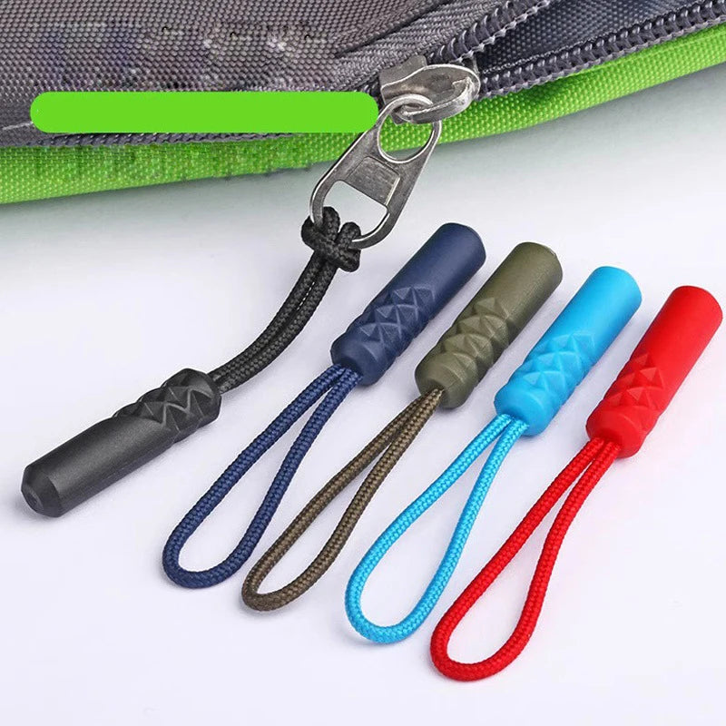 A set of replacement zipper pulls with nylon cords in various colors including black, blue, olive green, cyan, and red.