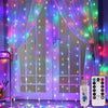 Purple LED curtain lights hanging in a doorway with a remote control and power adapter