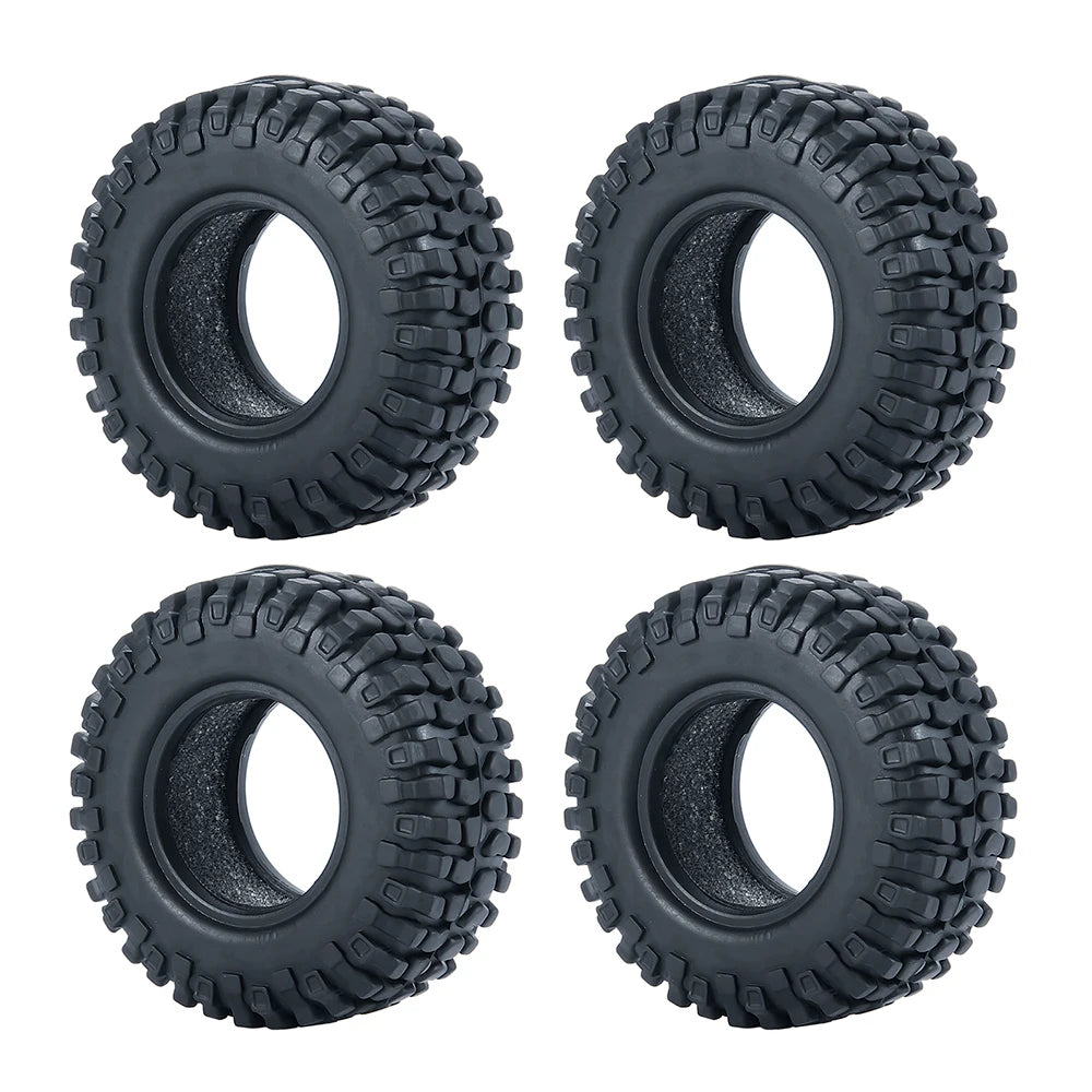 Two black soft rubber tires for 1/18 and 1/24 RC crawler cars shown from the top.