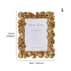 Elegant golden ginkgo leaf resin photo frame with a white background and a heart for you message