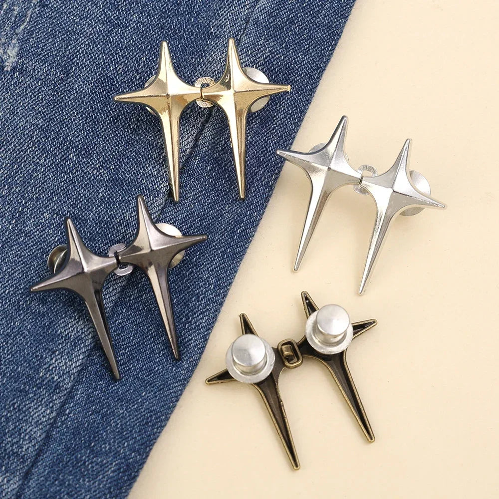 A collection of gold and silver Y2K star-shaped waist tightener clips for jeans displayed on a light background.