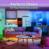 A modern living room decor featuring a pink sofa, glass table, and illuminated with blue LED lighting.