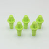 A set of five bright lime green replacement drivers for a Battling Top, packaged together.