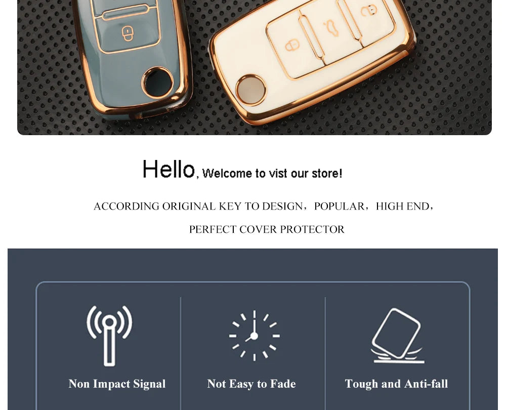 A pair of gold-colored TPU silicone key cases for car, VW, Skoda, and Seat flip keys shown on a dark surface.