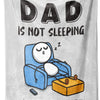 A gray fleece throw blanket featuring text that reads Dad is not sleeping and He's just resting his eyes.