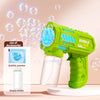 A green bubble gun is shown firing bubbles against a pink background, with an empty bottle and more bubbles visible.