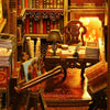 A wooden book nook kit featuring shelves, books, and a lamp setup for display.