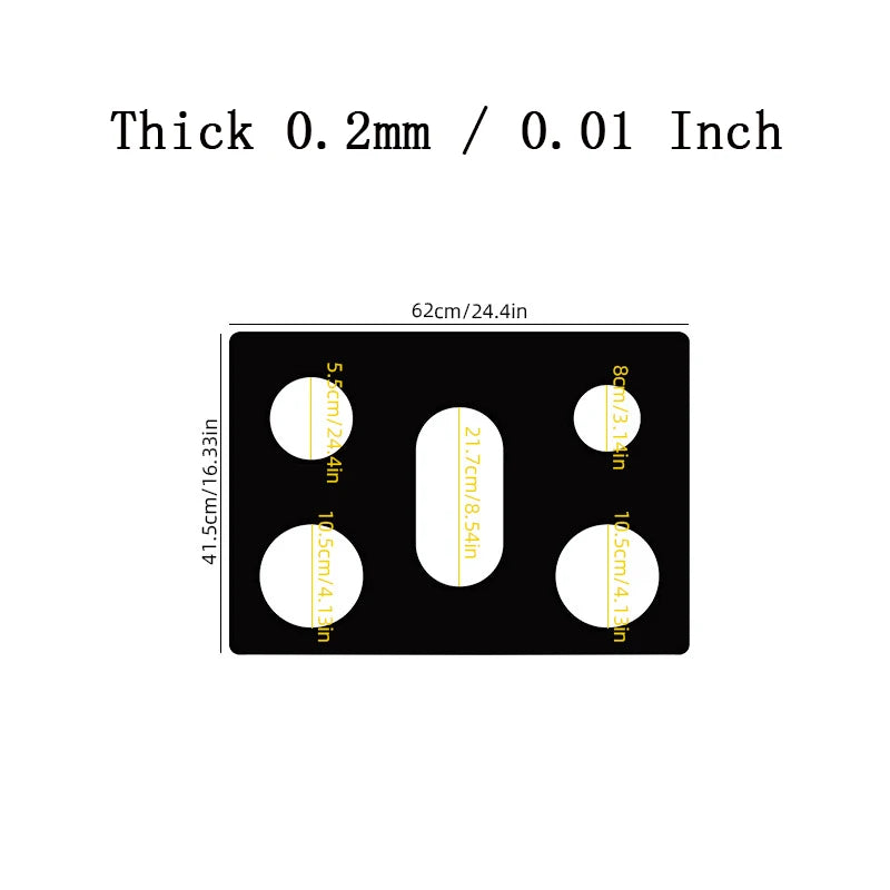 A black silicone mat with various sized circular cutouts for protecting a gas stove.