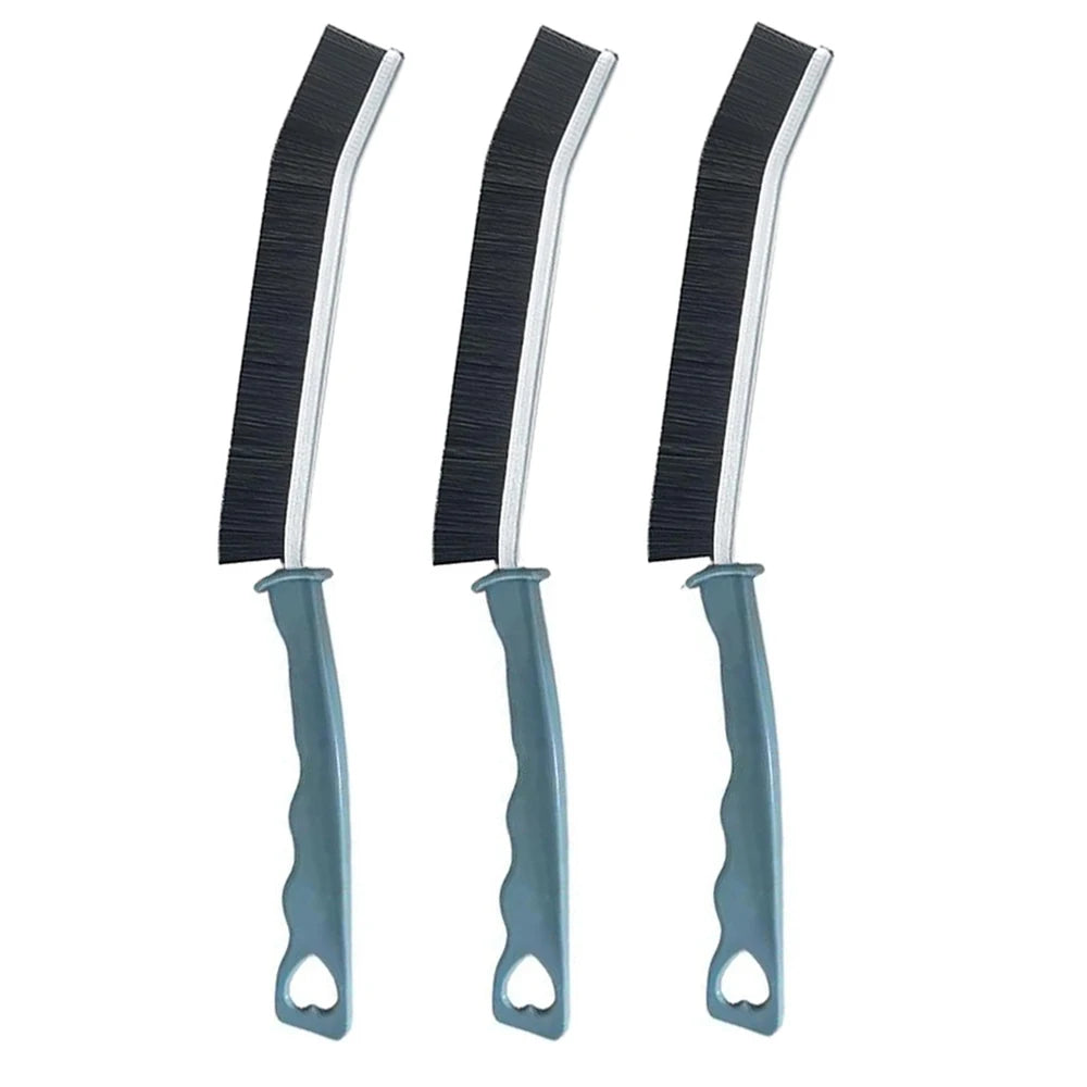 Three silver and black crevice cleaning brushes with ergonomic handles