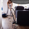 A person is using an adjustable tile leveling lifter for installation on a floor.