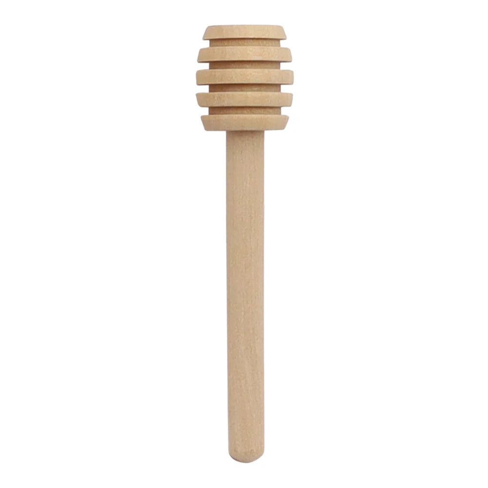 A natural wood honey dipper stick with stacked, rounded segments.