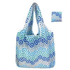 A light blue and gray patterned foldable floral shopping tote bag with an attached carry pouch.