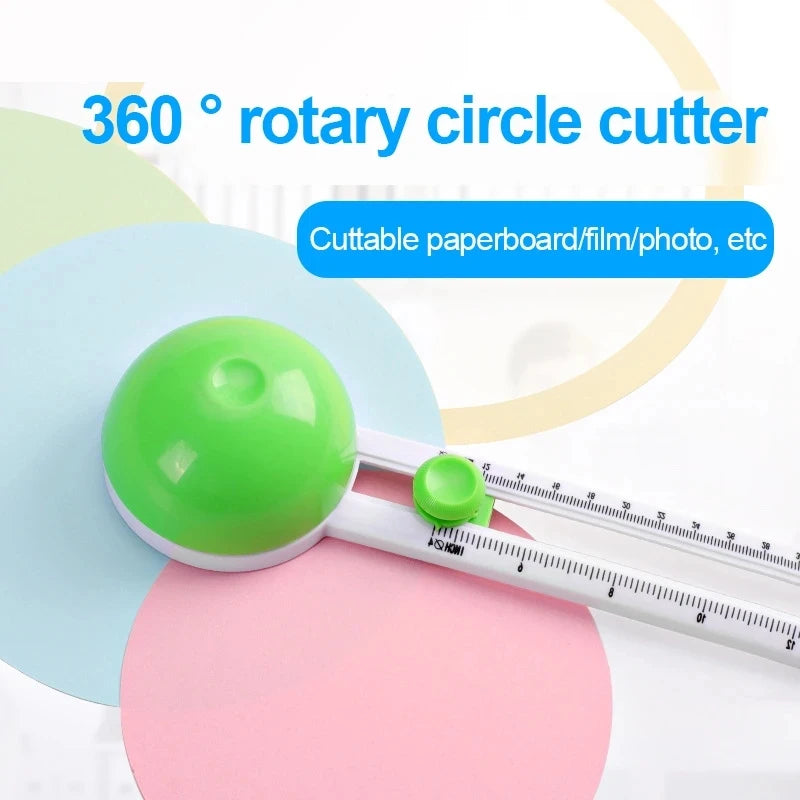 A green rotary circle cutter is shown next to a white measuring tool on pink and blue paper.