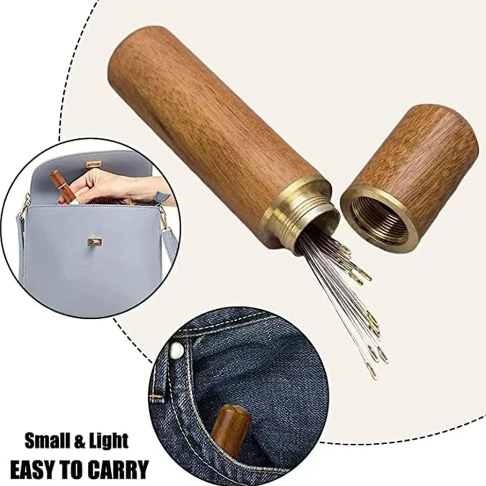 A wooden sewing needle kit showing a large wooden rod and several stainless steel self-threading needles.