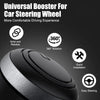 A close-up view of a black 360° rotating steering wheel spinner knob designed for a more comfortable driving experience.