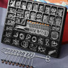 A black puzzle board containing numerous metal wire puzzles and a separate set of loose wires.