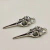 A set of five silver gothic skull and crow head charms for jewelry making